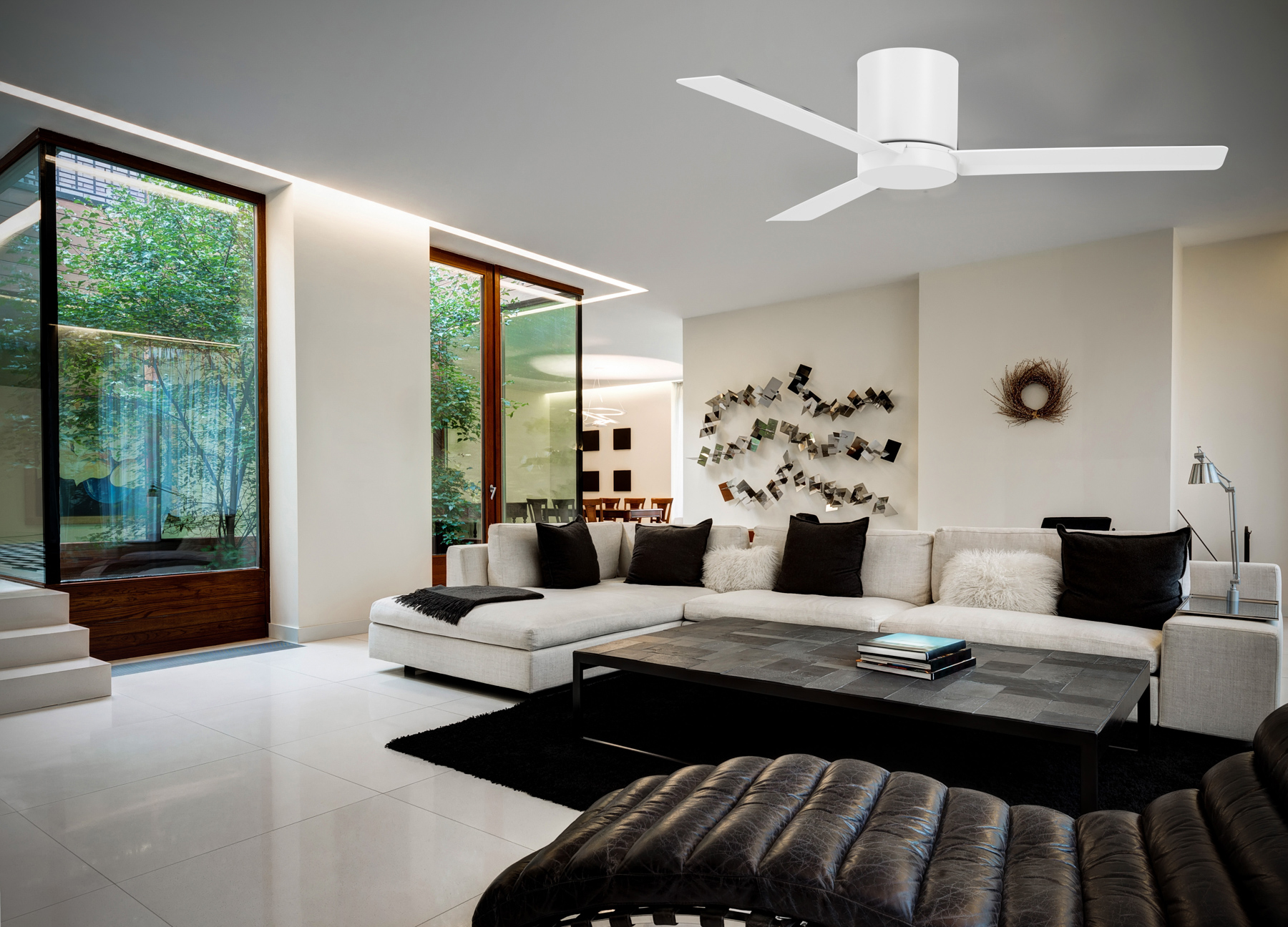 The Roto Flush combines modern aesthetics with practical functionality in a space-saving flush mount design. Perfect for rooms with lower ceilings, this 52" fan delivers efficient air circulation with integrated LED lighting. - alternate view