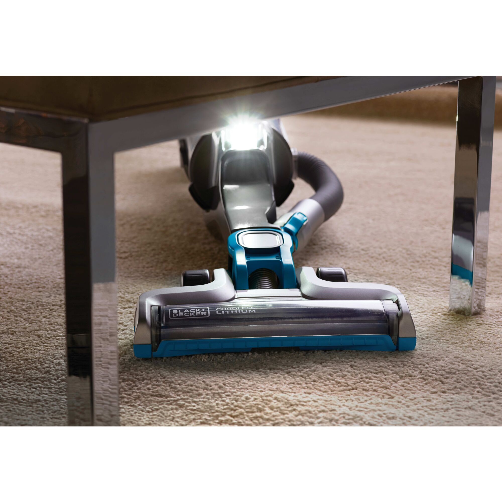 POWERSERIES PRO cordless 2 in 1 vacuum being used by a person to clean carpet.