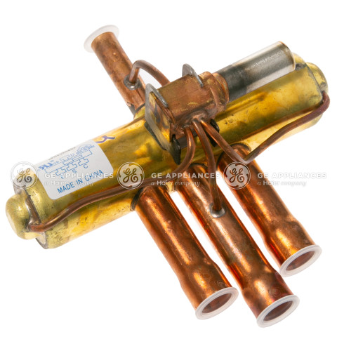 VALVE REVERSING ASSEMBLY