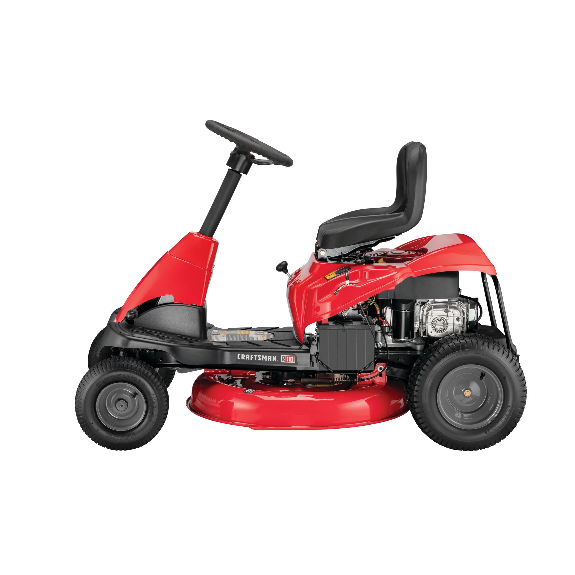 Profile of 30 inch 10 h p gear drive mini riding mower with mulching kit.