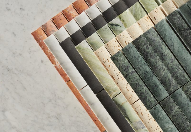 a row of marble tiles on a marble surface.