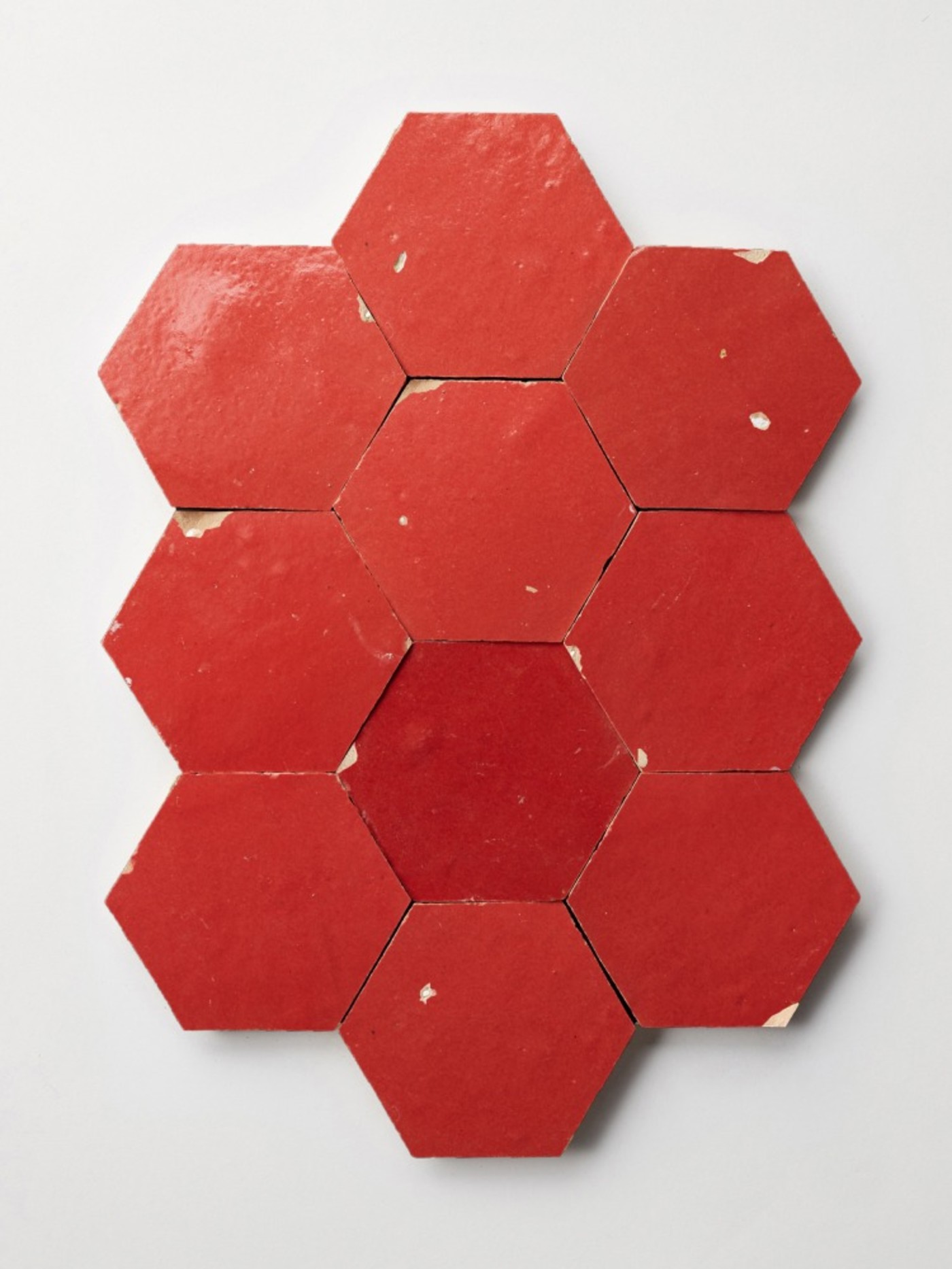 red hexagon tiles on a white background.