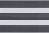 Dual-layer horizontal zebra roller blind mounted across the frame, aligned into alternating wide opaque white bands and narrow ribbed dark-gray slats, partially filtering light; interior close-up with soft even lighting.