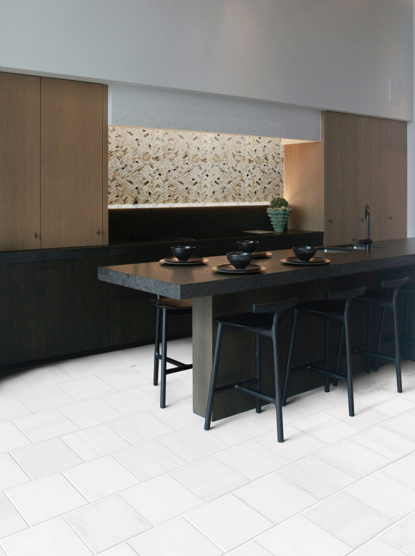 a kitchen with a white tile floor and black table and chairs.