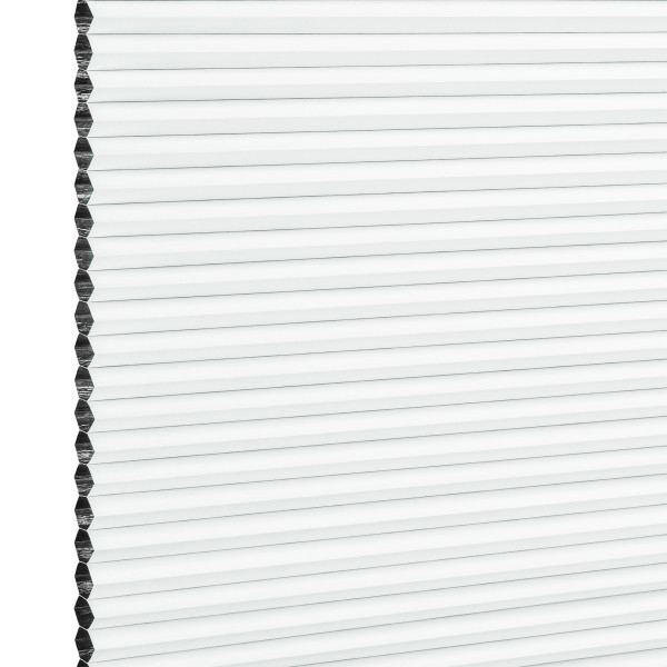 White honeycomb (cellular) window blind with visible hexagonal edge, fully lowered and closed, diffusing bright daylight and covering the window; simple, evenly lit background, no room details.
