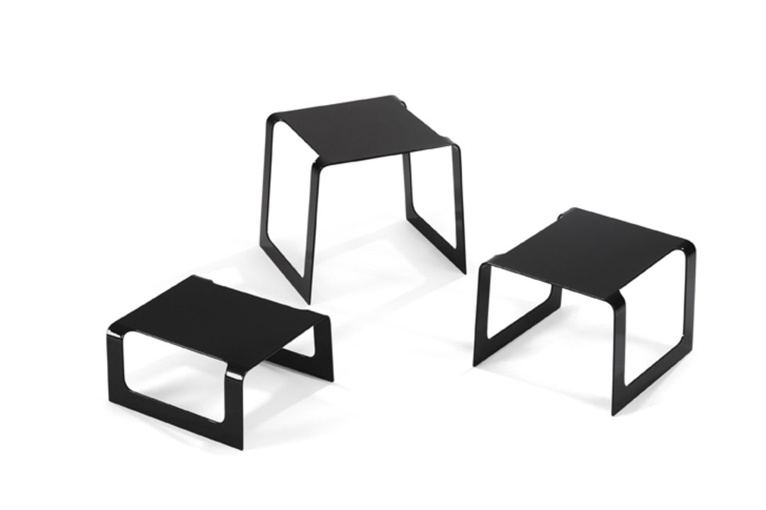 Square-bent stainless steel buffet riser set in black