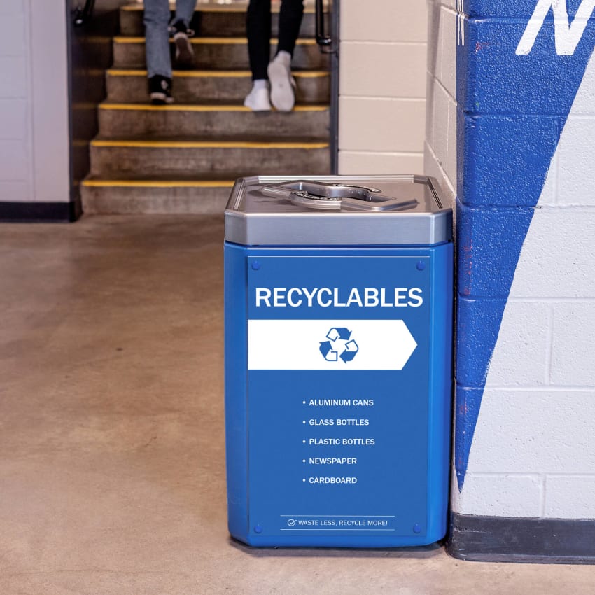 large capacity recyclables container in a sports stadium with a mixed opening restrictive lid