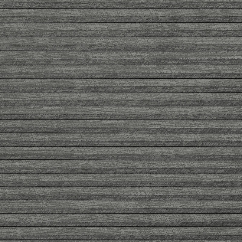 Gray textured horizontal pleated fabric blinds, fully closed with overlapping slats and subtle weave, blocking any view; set against an interior wall under soft, even indoor lighting.