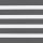 Zebra-style roller blind with alternating dark gray opaque and white translucent horizontal bands; bands aligned across frame, partially filtering light; interior setting with even, diffuse lighting, no visible window.