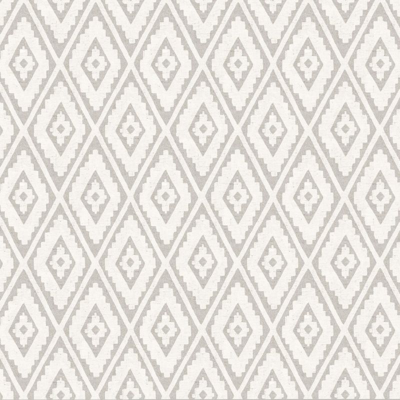 Patterned wallpaper: overlapping stepped diamonds in light beige and off-white â€” repeating across a flat surface â€” even, neutral lighting with no additional room features visible.