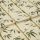 Folded fabric sample in cream background with linear print of bamboo shoots and leaves.