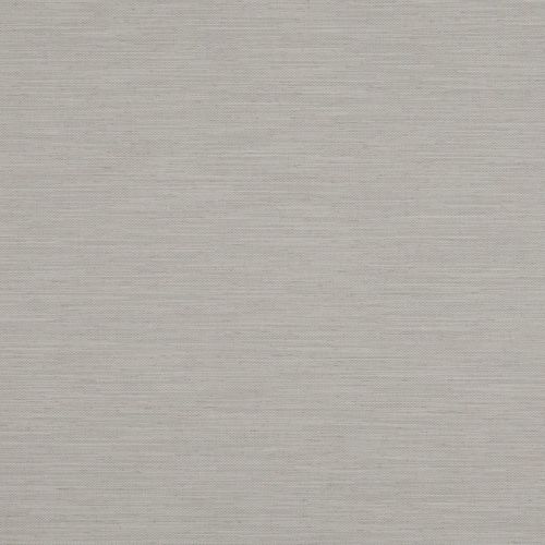 A light grey-beige woven roller blind, fully lowered and opaque, filtering soft daylight; neutral textured fabric fills the frame, suggesting a closed window in a softly lit interior.