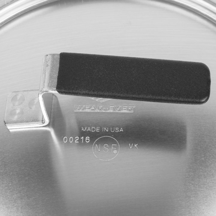 9 3/16-inch Wear-Ever® domed aluminum cover with satin finish and dipped handle