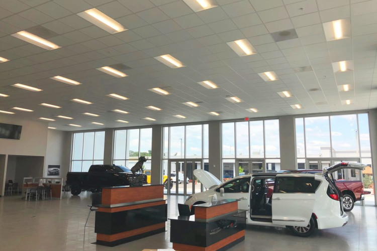 Car dealership with Lumination LED Lighting Fixtures and Daintree Integrated Wireless Lighting Controls