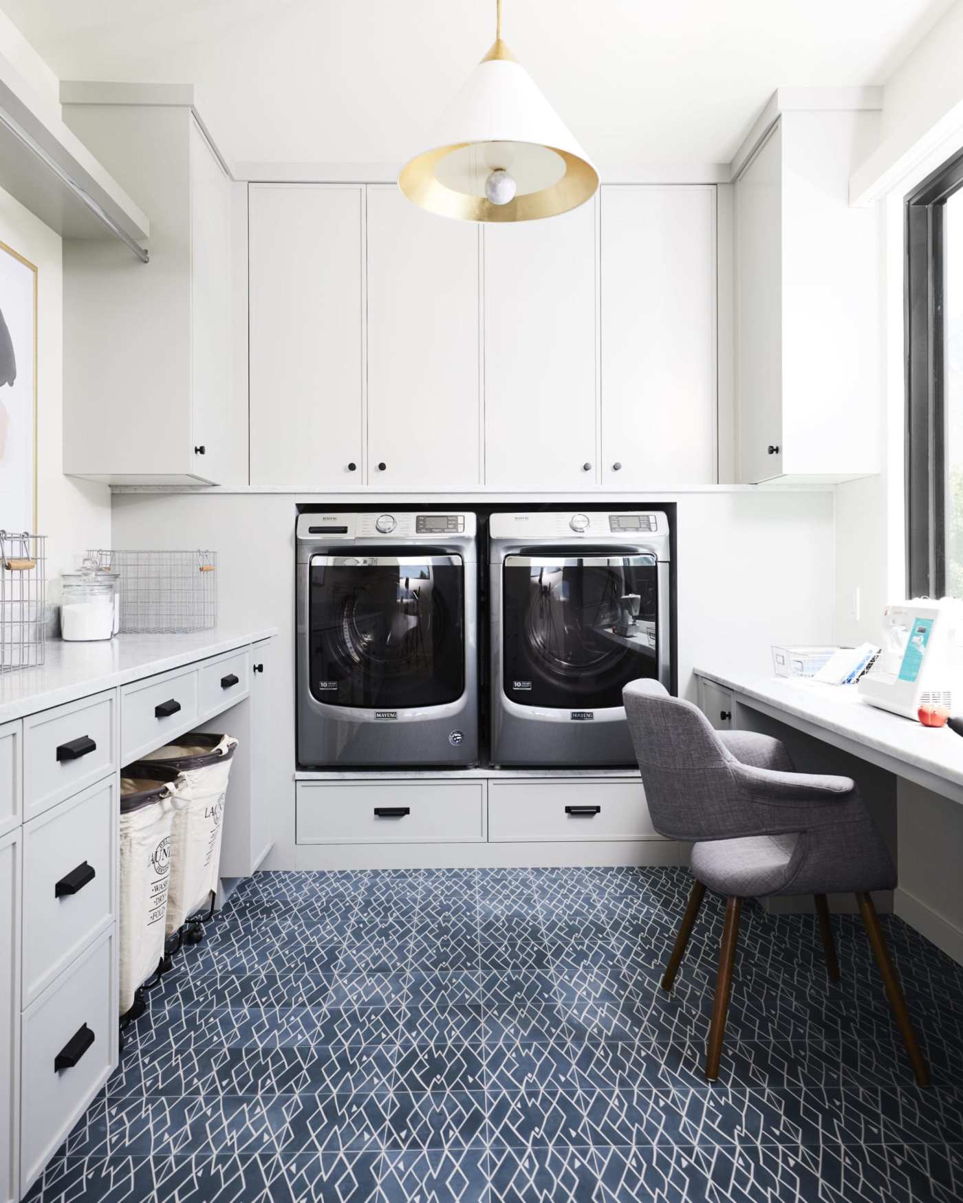 a laundry room with a washer and dryer.