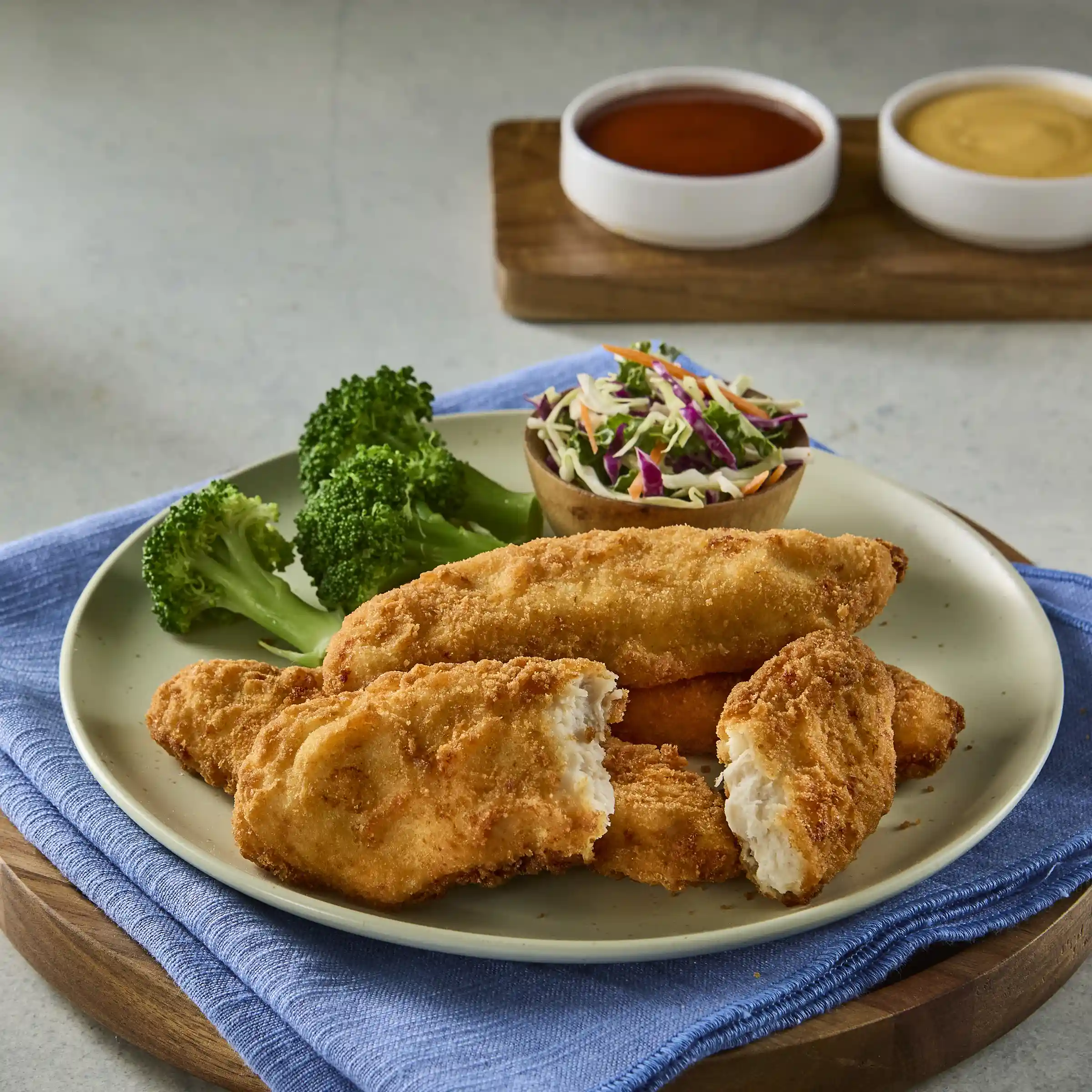 Tyson Red Label® Fully Cooked Golden Crispy Select Cut Chicken Tender Fritters  https://images.salsify.com/image/upload/s--gzV8Oq6C--/q_25/6c5bb8f7e382bcc576fa3ac44b83520bc6d62109.webp