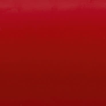 Smooth glossy red panel displaying a subtle darker-to-lighter vertical gradient, occupying the entire frame as a uniform, minimally textured background under even lighting.