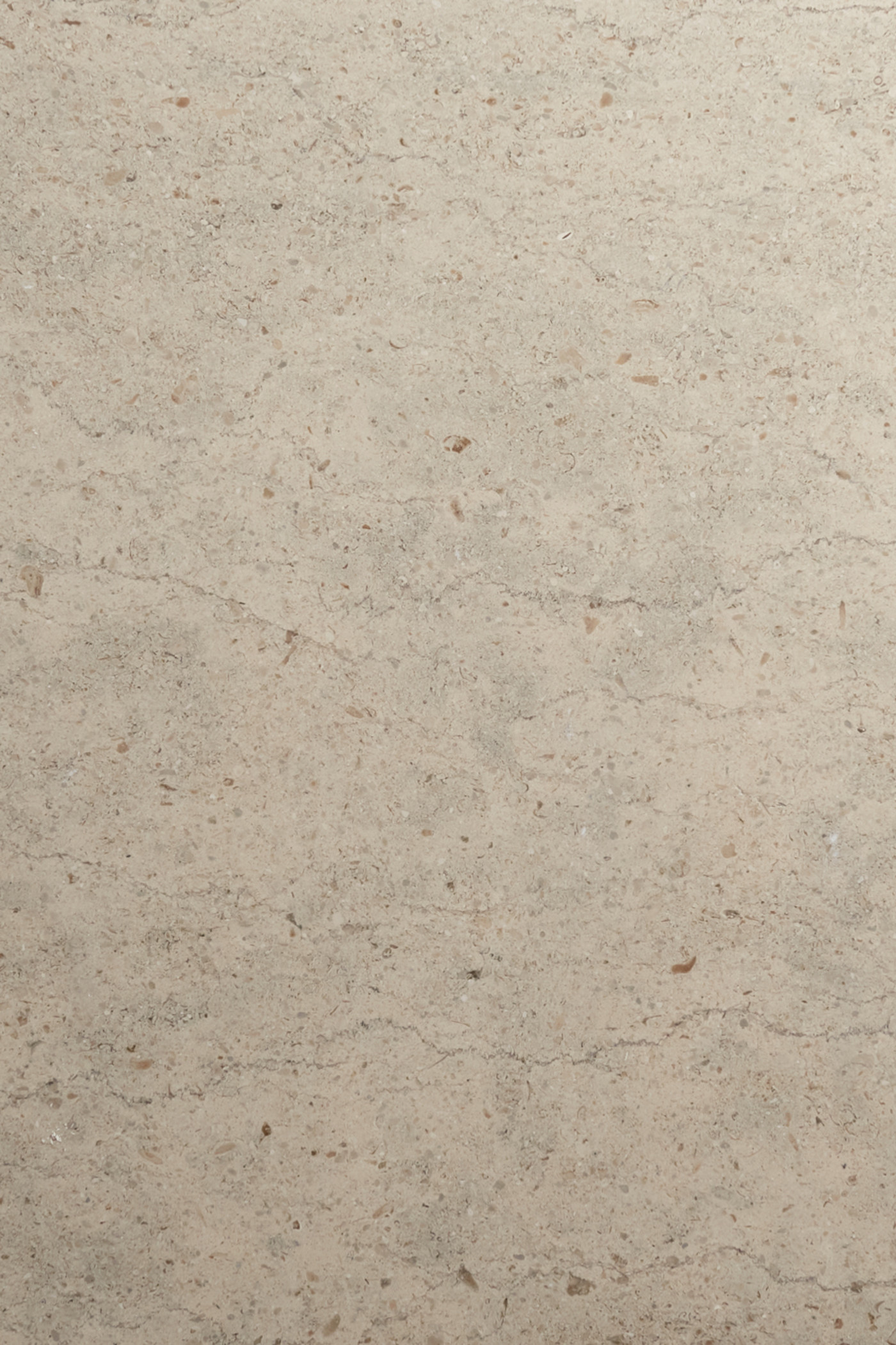 a close up image of a beige marble wall.