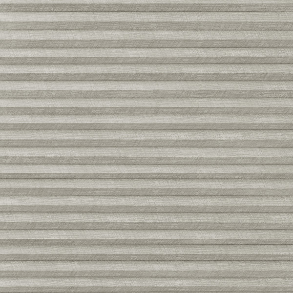 Pleated cellular window shade, light-gray textured fabric; fully lowered and closed, forming horizontal ridges; filtering diffuse interior light and obscuring any outside view.
