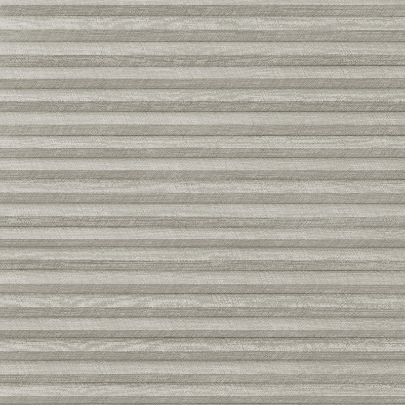 Pleated cellular window shade, light-gray textured fabric; fully lowered and closed, forming horizontal ridges; filtering diffuse interior light and obscuring any outside view.