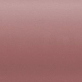Dusty rose fabric-like panel fills the frame, showing a subtle horizontal gradient and fine texture, evenly lit against a neutral, featureless background with soft, diffuse light.