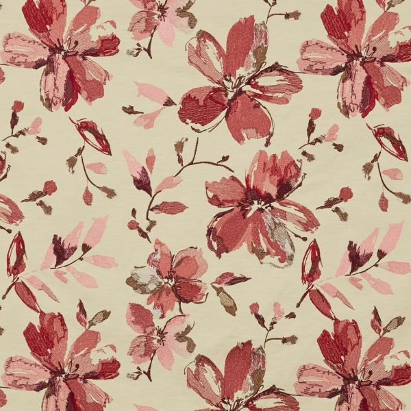 Beige fabric with large sketchy red and pink floral motifs — repeating all-over pattern across the surface — flat-lit close-up showing textured, embroidered-like detail.
