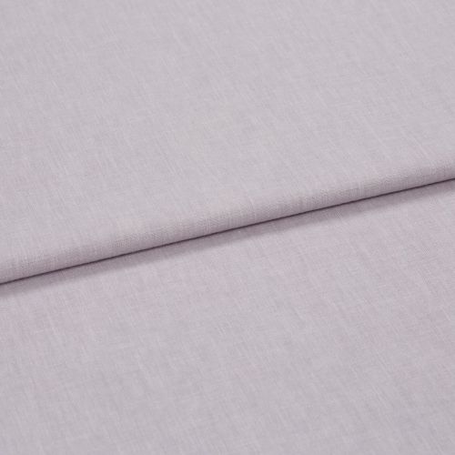 A folded pale lavender woven fabric, folded once to create a horizontal overlap, close-up on a flat surface with soft, diffuse lighting highlighting the subtle weave texture.
