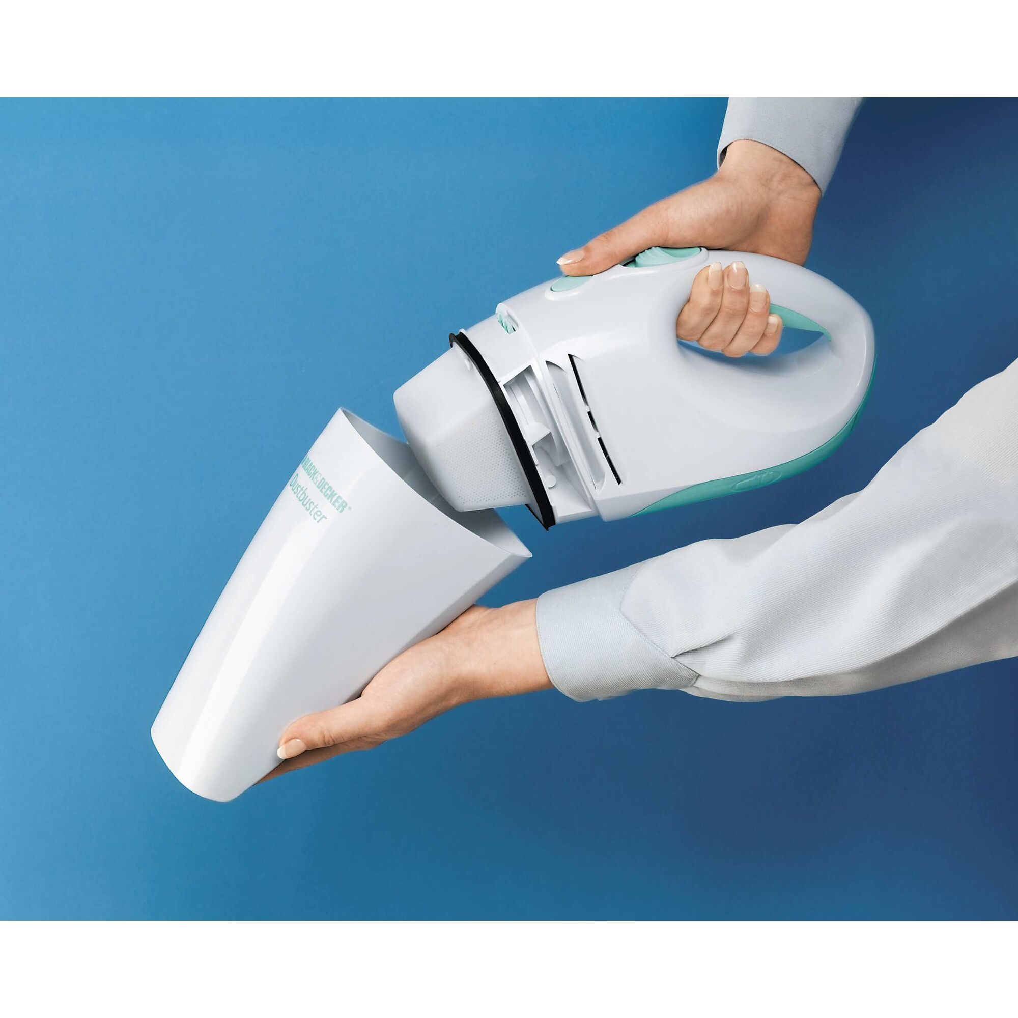 Replacement filter being used in dustbuster hand vacuum.