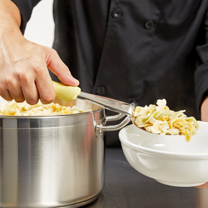 14-inch heavy-duty stainless steel solid basting spoon with yellow Ergo Grip™ handle