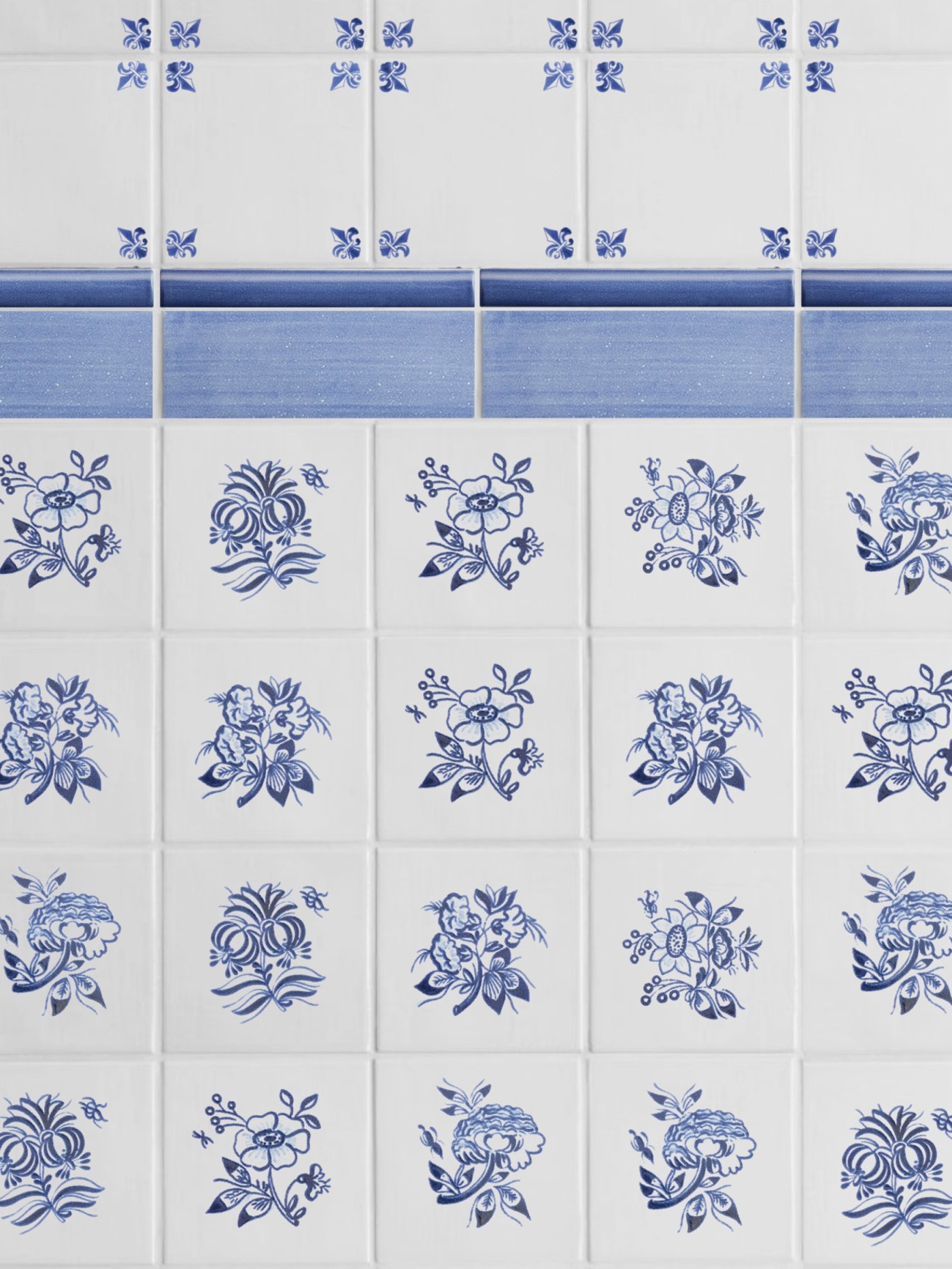 a blue and white tiled wall with floral designs.