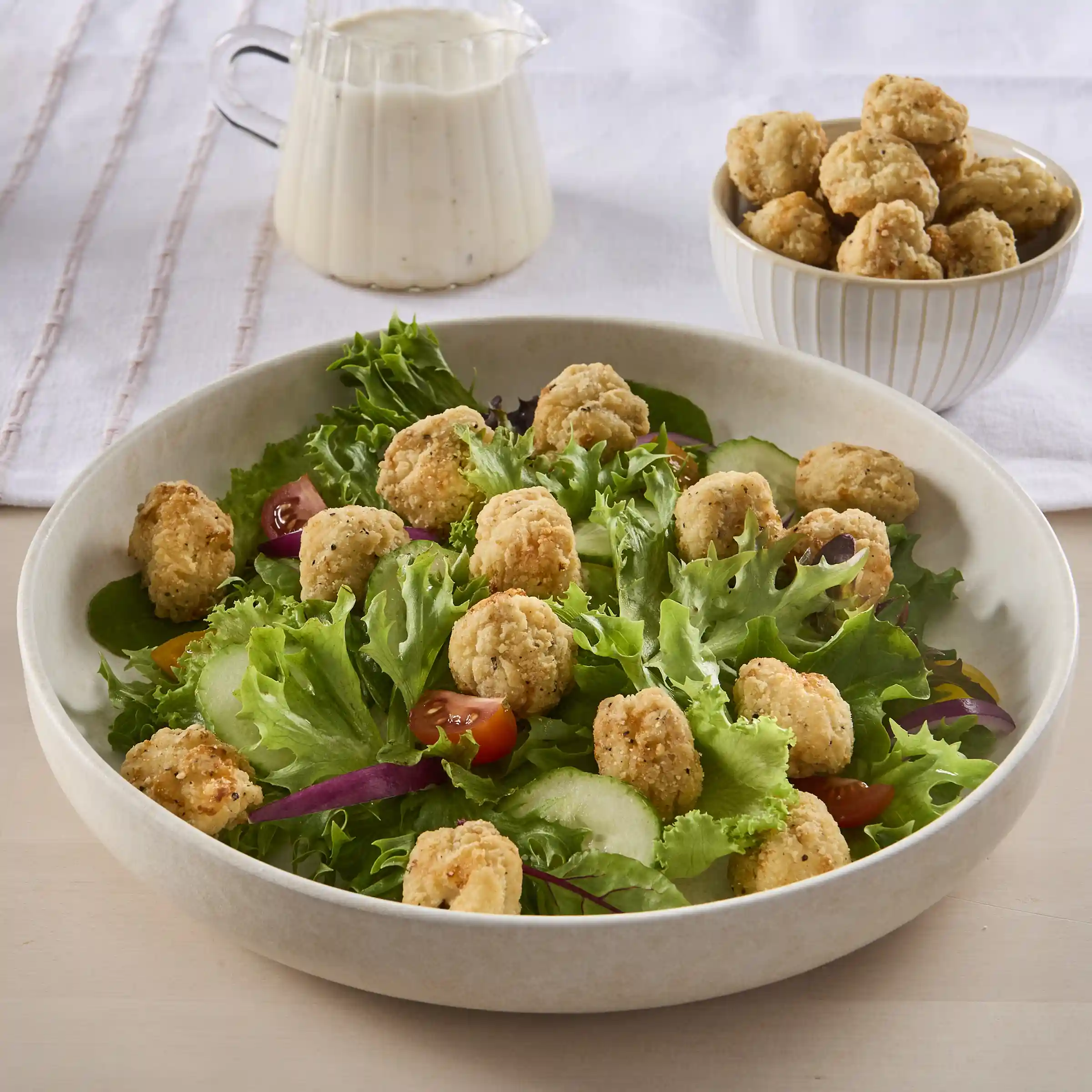 Tyson® Popcorn Chicken Bites® Uncooked Homestyle Breaded Chicken Chunks https://images.salsify.com/image/upload/s--LomRFeQI--/q_25/64de746f9070431d215075e18a1f934a4f46dcc3.webp