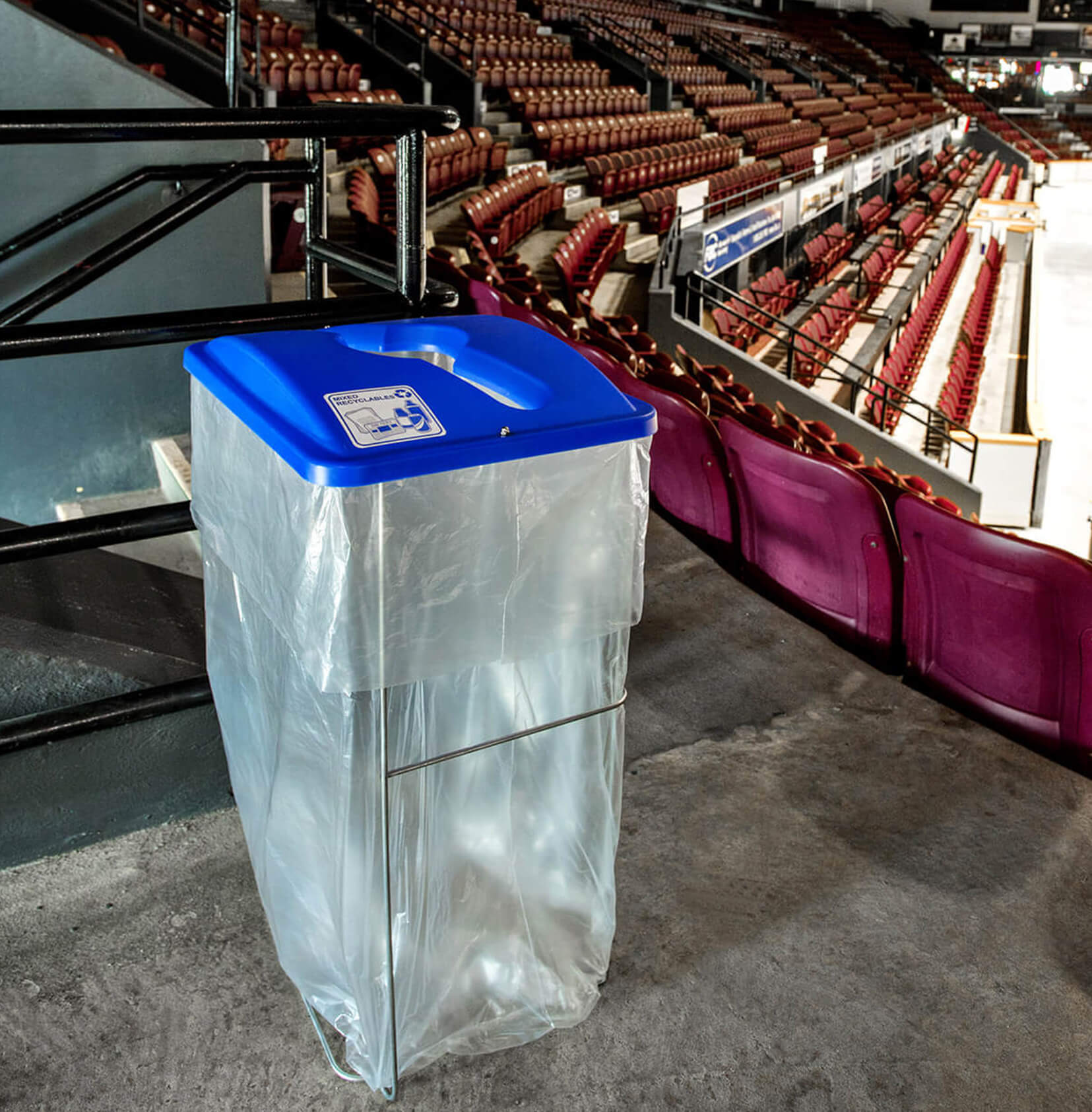 event bin for collection mixed recycling with a blue plastic lid in a hockey arena