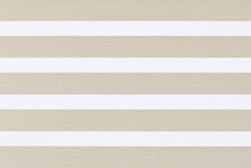Layered horizontal-striped window blind (zebra style) across a window, alternating opaque white and beige woven sheer bands; closed in a neutral-lit interior, softly diffusing daylight.