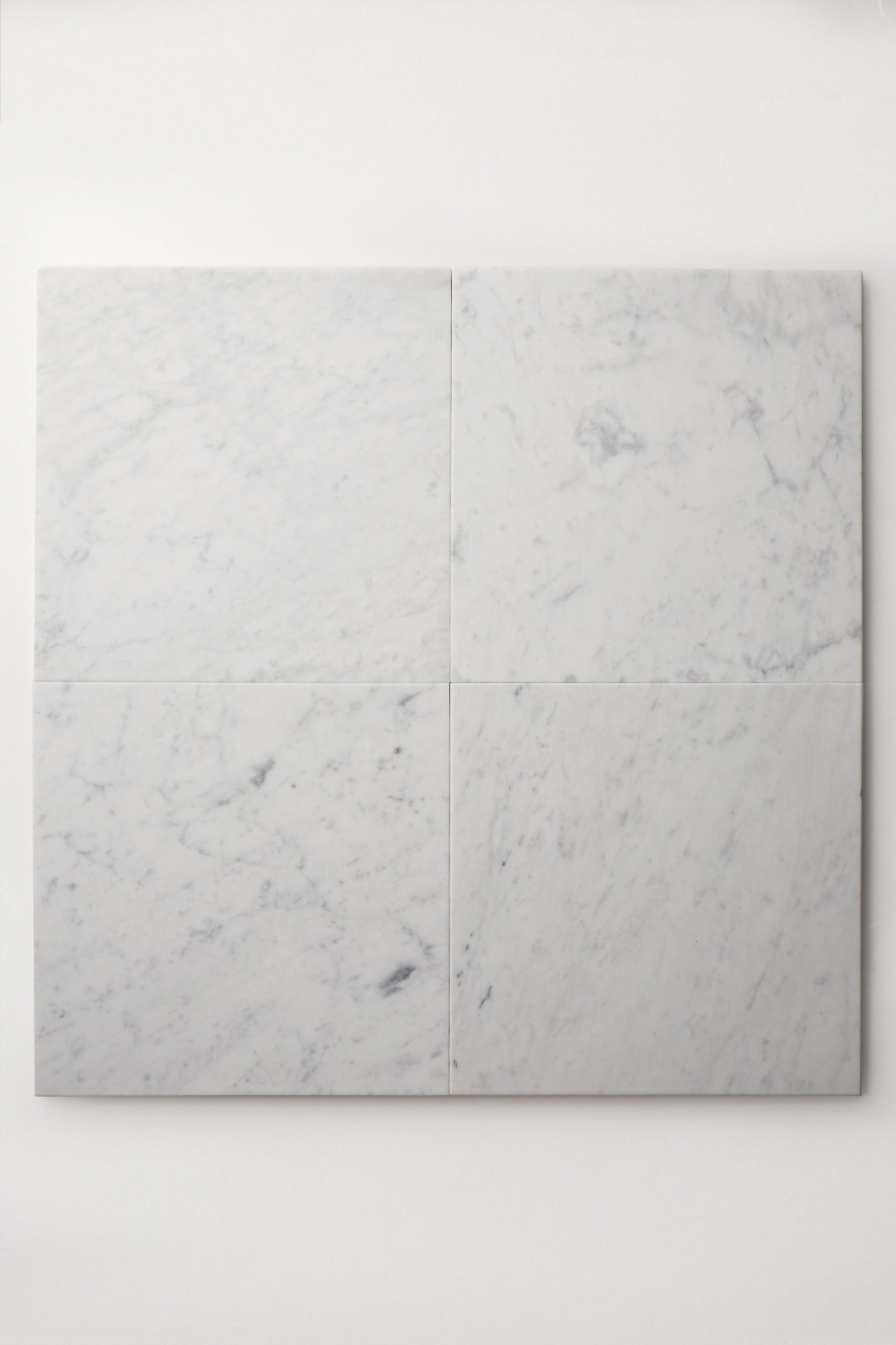 a white marble tile on a white background.