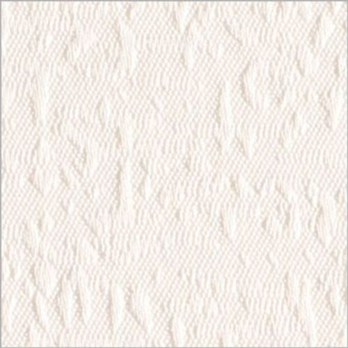 Off-white embossed paper-towel–like surface with diagonal waffle texture and random creases; lying flat and slightly wrinkled; close-up, evenly lit, neutral studio background.