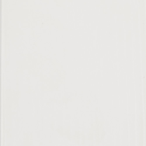 Blank off-white painted wall (smooth surface with subtle vertical seam at right) filling the frame; reflecting diffused light evenly; neutral indoor setting with no visible furnishings or windows.