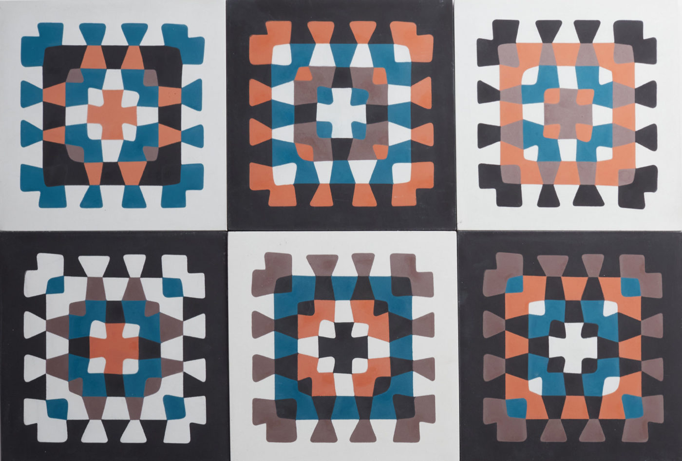 a series of tiles with blue, orange, and brown crochet patterns.