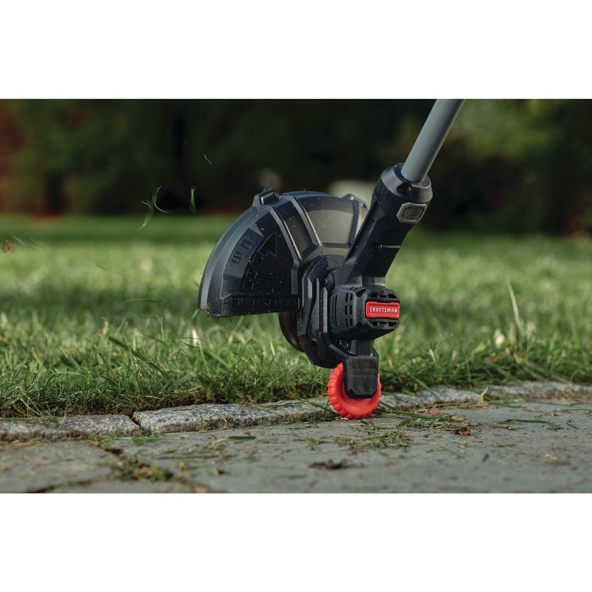 Integrated wheeled edge guide 20 volt cordless 10 inch weedwacker string trimmer and edger 1.5 ampere per hour.