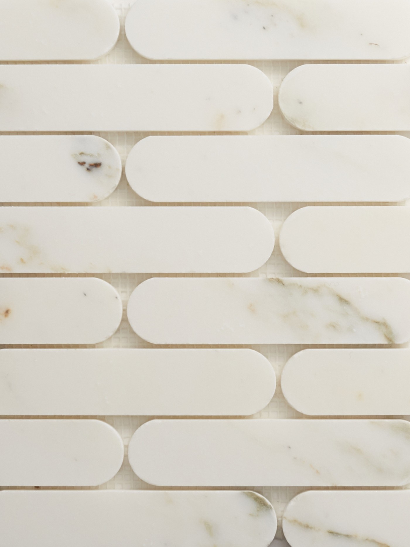 a close up image of a white marble tile.