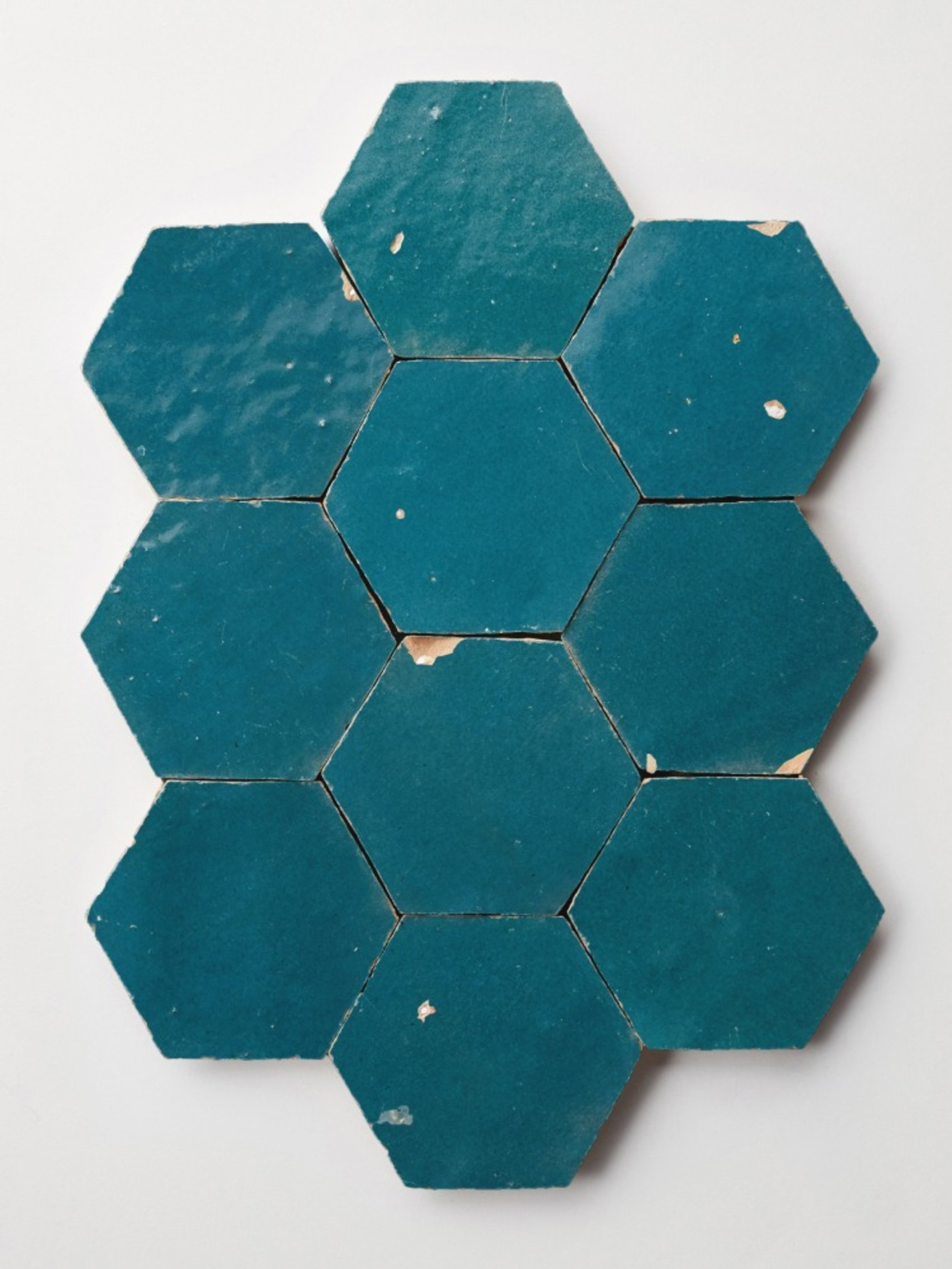 blue hexagon tiles on a white background.