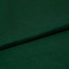 Deep emerald green felt fabric, folded once creating a soft overlapping seam; close-up studio view showing fine texture, matte finish, and even, subdued lighting.