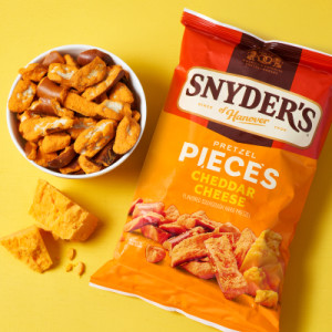 Styledimage for Snyder’s of Hanover Pretzel Pieces, Cheddar Cheese, 8 Oz