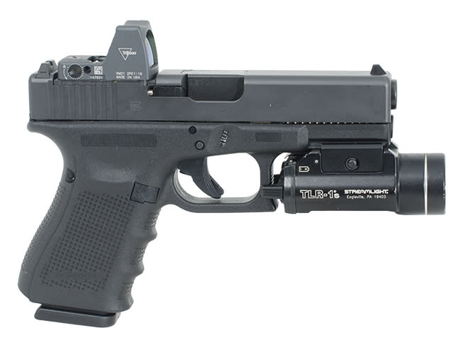 Glock 19 LE MOS 9mm with 3 mags (15 rd) Trijicon RM01 3.25MOA red dot, Streamlight TLR-1s Light, and Kydex holster. Used: Excellent condition UA1193 PG1950202MOS