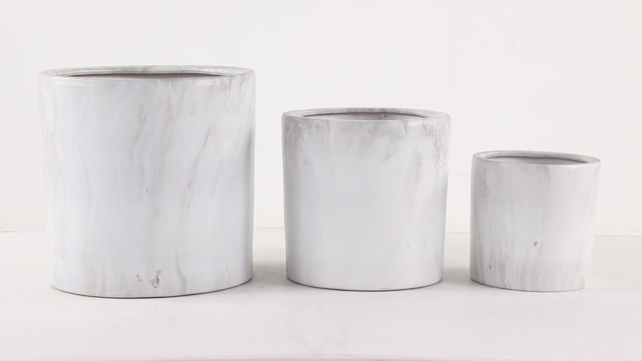 thumbnail video image 2 of CosmoLiving by Cosmopolitan 15", 12", 9"H Indoor Outdoor White Porcelain Planter (3 Count), 2 of 11