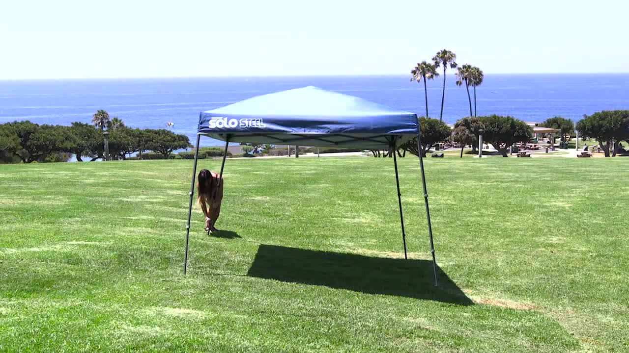 thumbnail video image 2 of Quik Shade 167542DS SOLO90 11 x 11 ft. Slant Leg Canopy, Khaki Cover - Gray Frame, 2 of 4