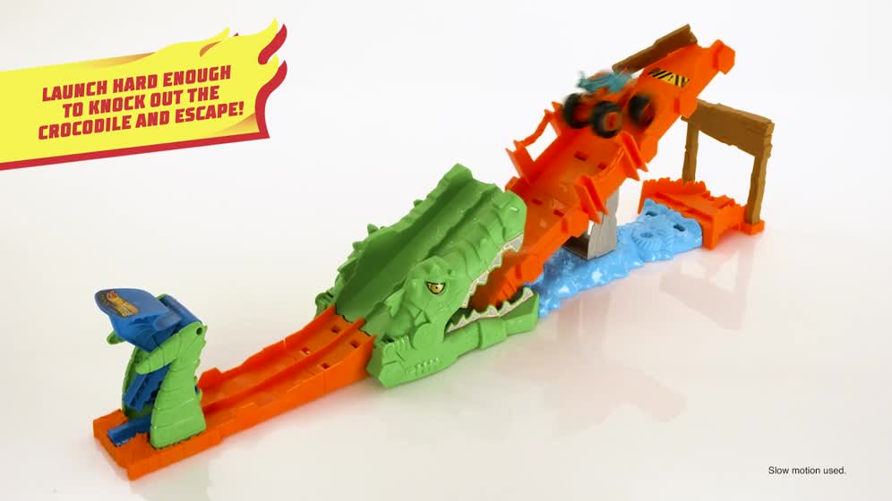thumbnail video image 2 of Hot Wheels Monster Trucks Crocodile Crash Challenge Playset & 1:64 Scale Mega-Wrex Toy Vehicle, 2 of 7