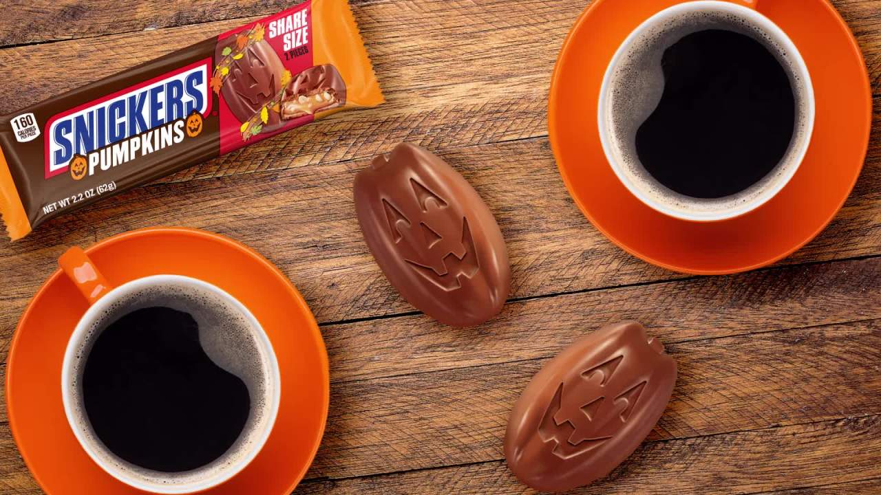 thumbnail video image 2 of (2 pack) Snickers Pumpkins Chocolate Halloween Candy Bars, Share Size - 2.2 oz pack, 2 of 14
