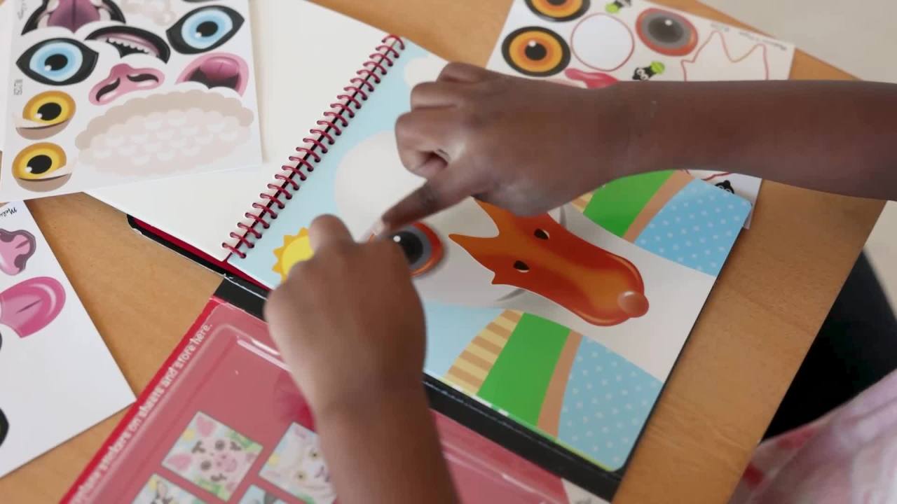 thumbnail video image 2 of Melissa & Doug On the Go Make-a-Face Reusable Sticker Pad Travel Toy Activity Book – Farm Animals (10 Scenes, 76 Cling Stickers) - FSC Certified, 2 of 10