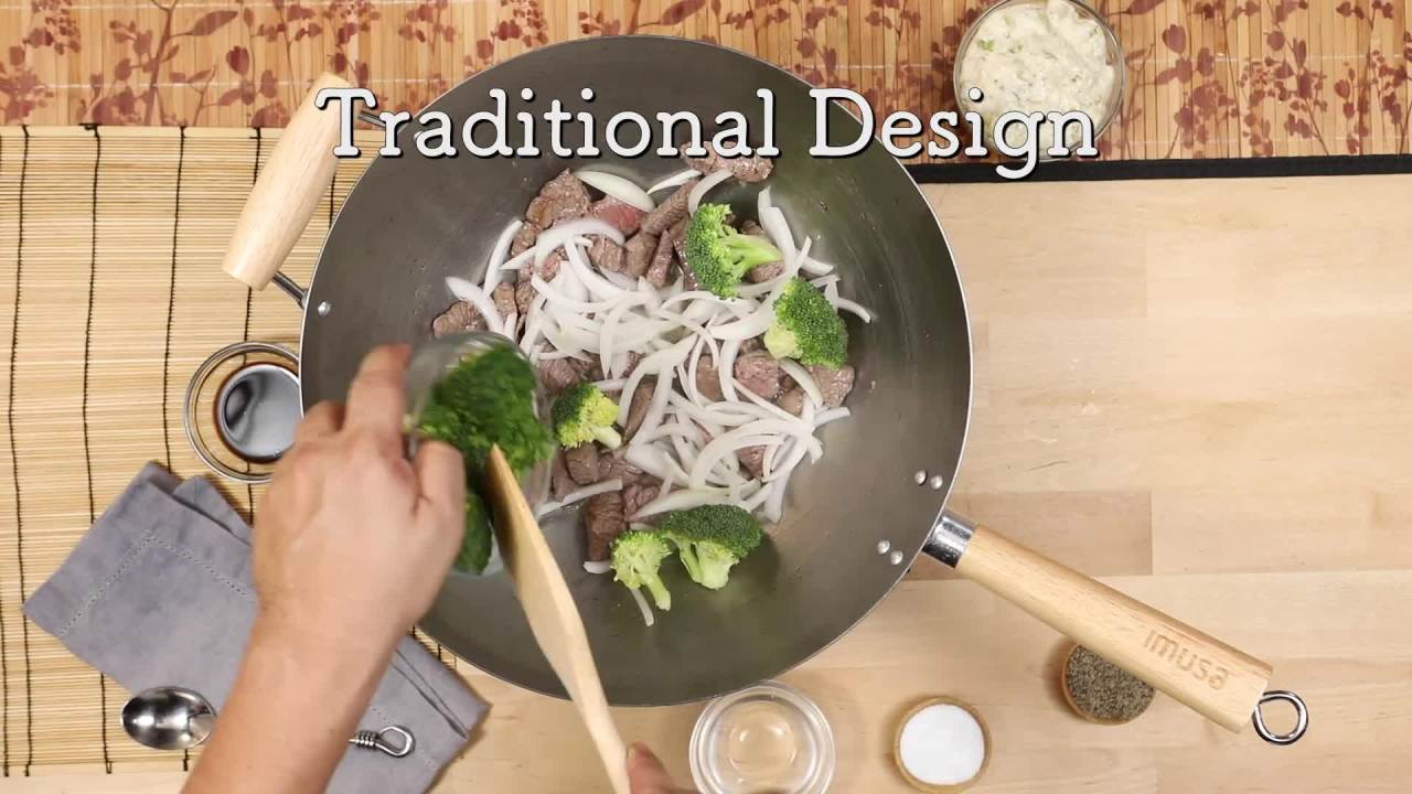 thumbnail video image 2 of IMUSA  14in Carbon Steel Wok with Wood Handles, 2 of 9