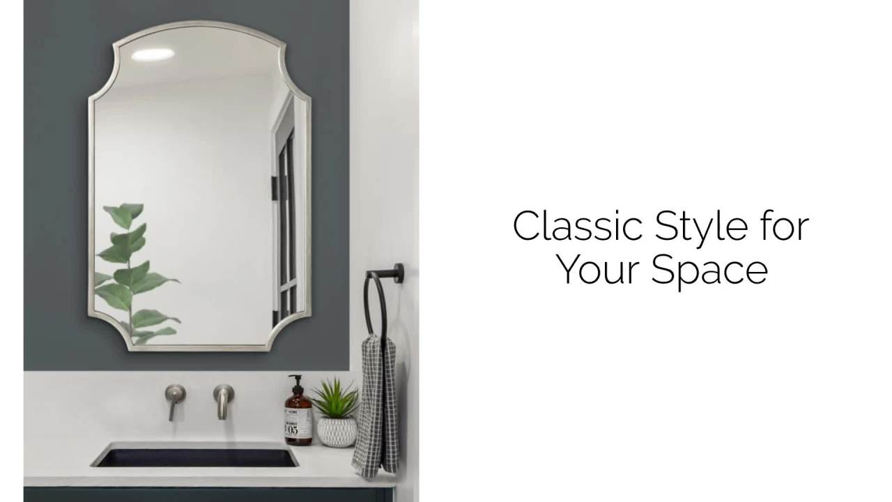 thumbnail video image 2 of Kate and Laurel Carlow Modern Scalloped Mirror, 20 x 30, Silver, Glamorous and Contemporary Decorative Wall Mirror with Scalloped Corners and Rounded Edges, 2 of 9